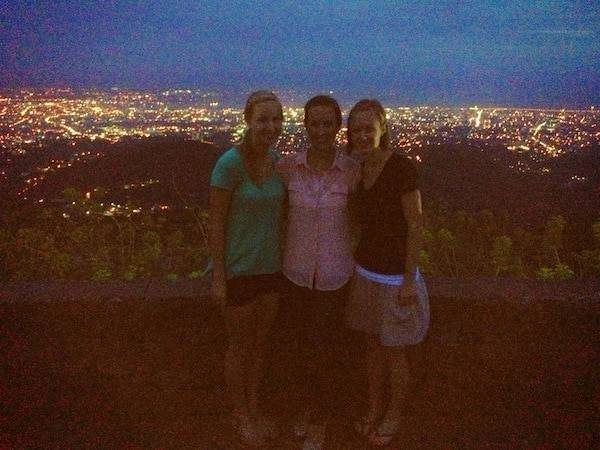 Three women smiling.