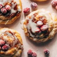 Cream cheese danishes with sugared cranberries on top