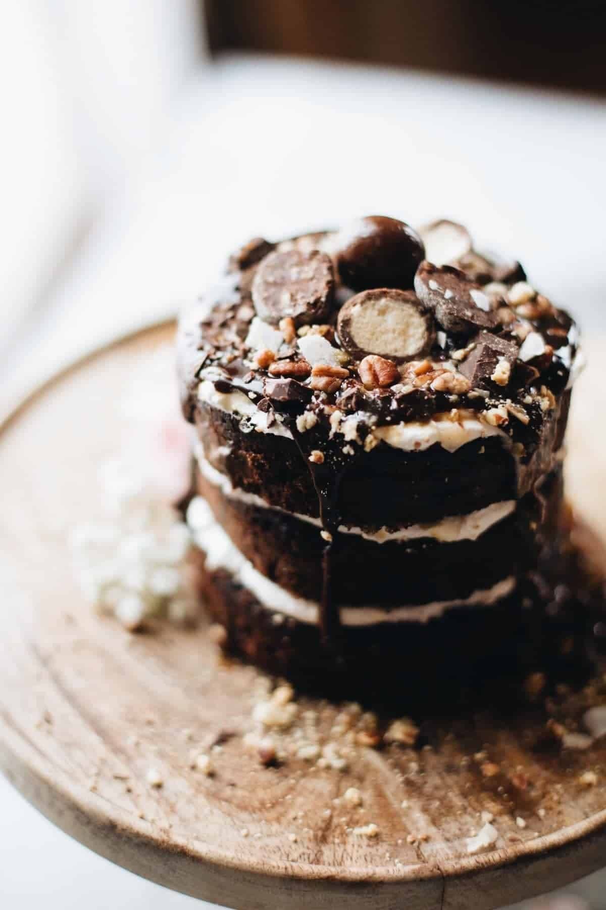 Chocolate cake on a cake stand.
