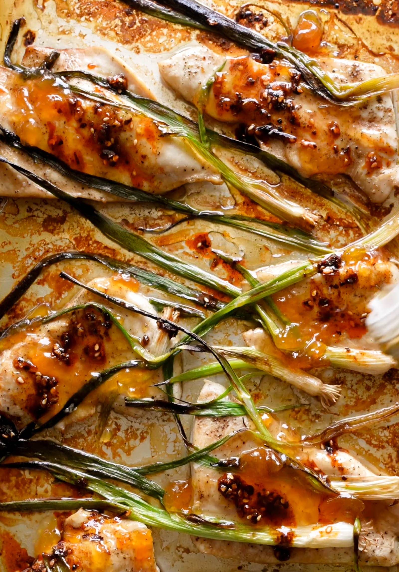 Apricot chicken on a sheet pan.