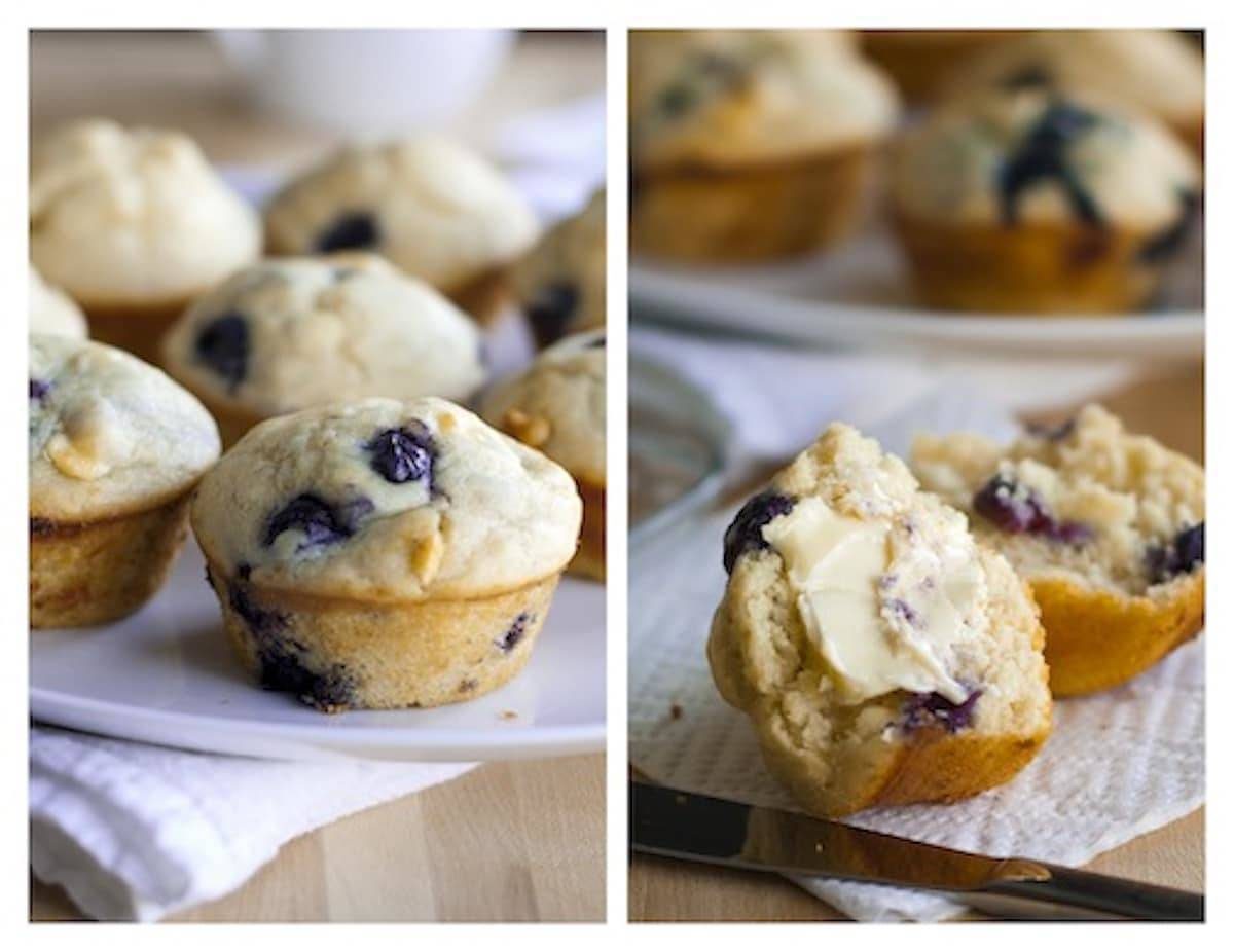 White chocolate blueberry muffins on a napkin with butter.