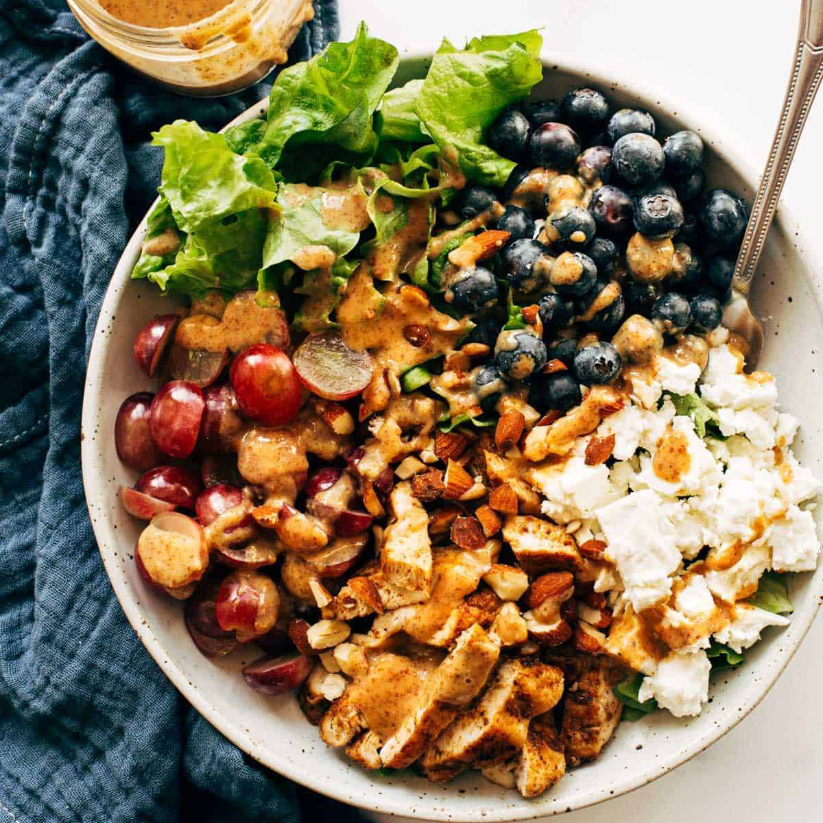Rainbow chicken salad in a bowl.