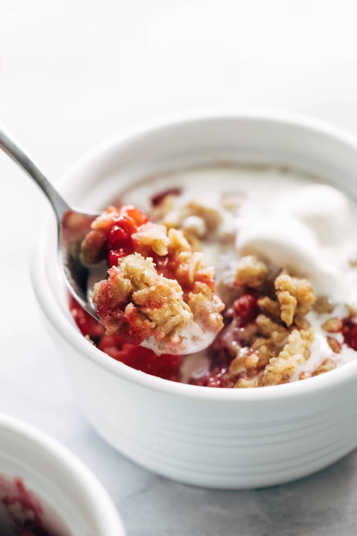 Spoonful of raspberry crumble.